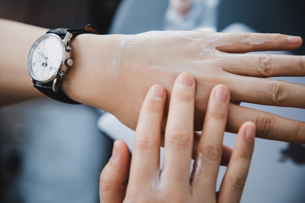 female-applying-lotion-to-the-hand