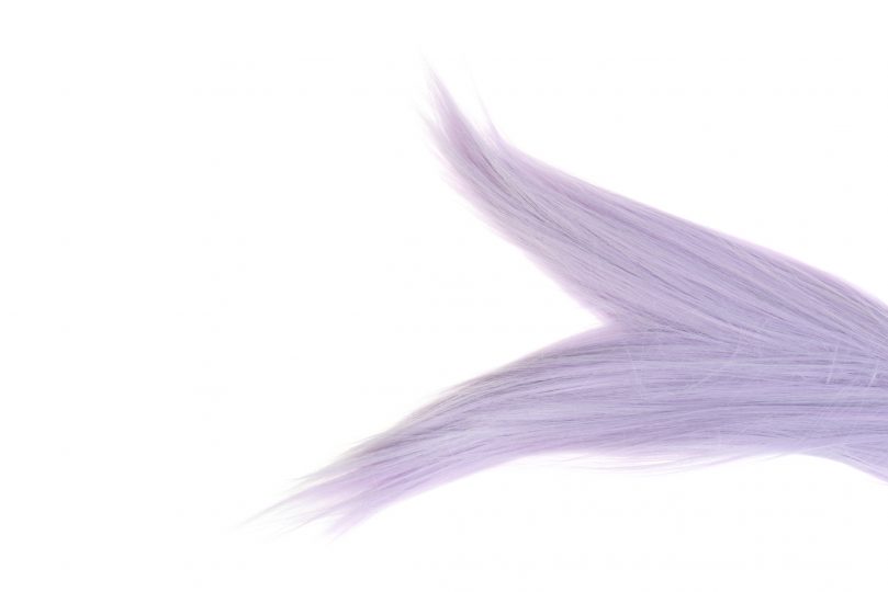 a-piece-of-mauve-color-hair-with-split-ends