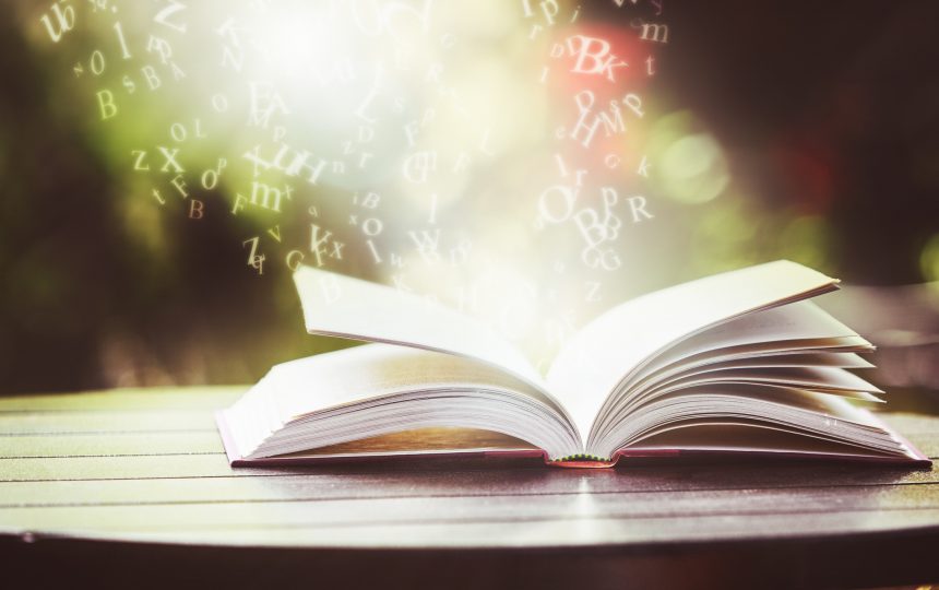 misty-letters-float-up-from-open-book-words-are-magic