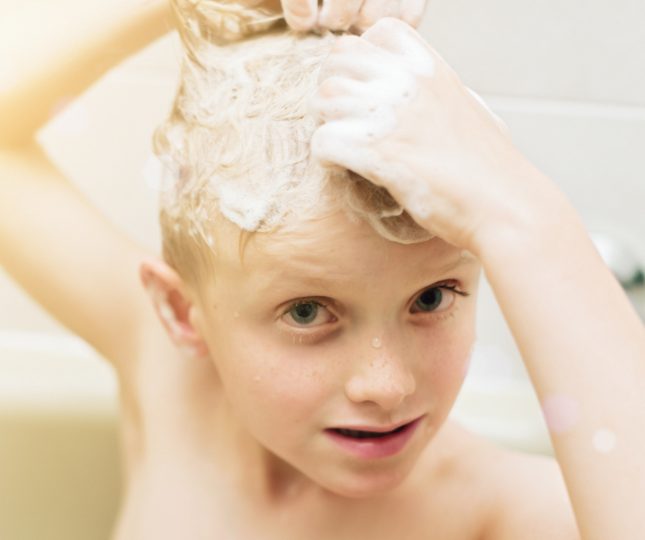 little-blond-boy-washing-his-hair-in-the-bath