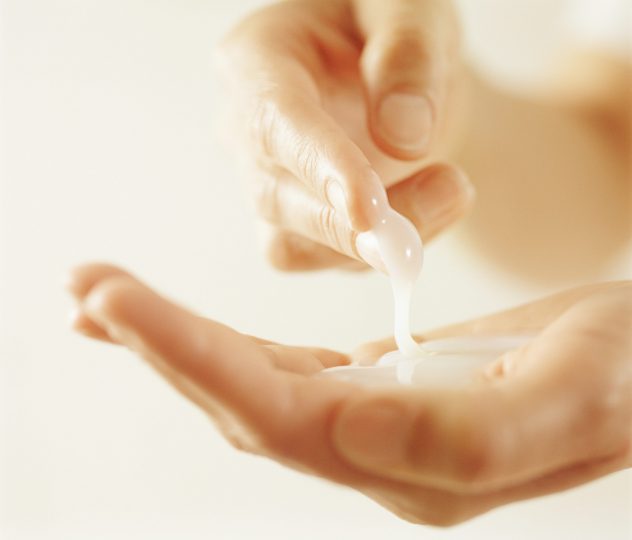 woman-with-lotion-in-her-hand