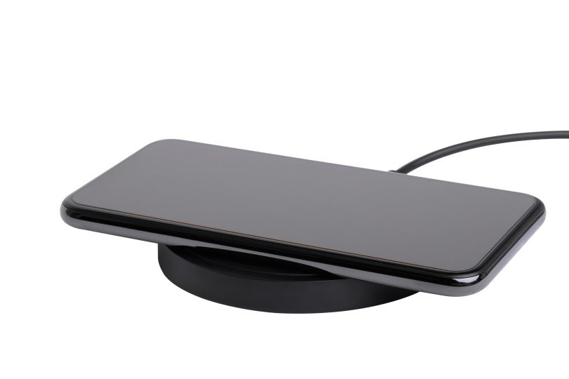 wireless-charger-with-mobile-phone-isolated-on-white-background