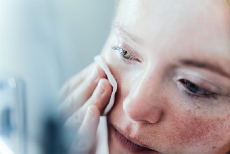 woman-cleaning-her-face-2