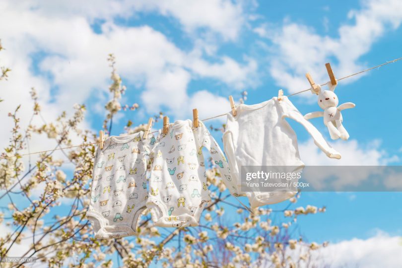 baby-clothes-are-drying-on-the-street-selective-focus-nature