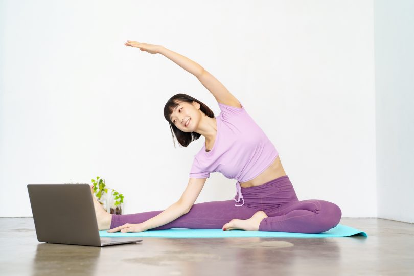 a-woman-taking-an-online-yoga-lesson